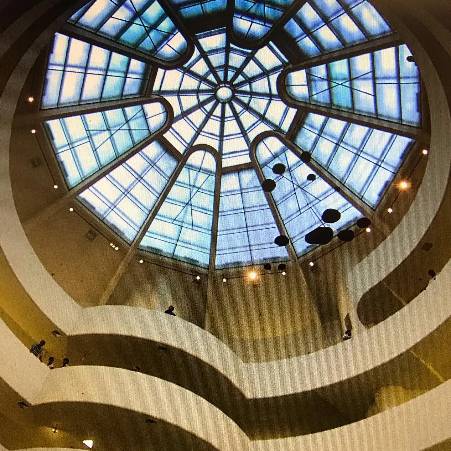 Looking up into the Guggenheim Museum's domed skylight above its curving ramps